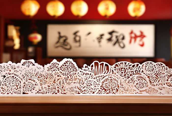 剪纸在生活中的应用论文（剪纸在生活中的应用论文怎么写）